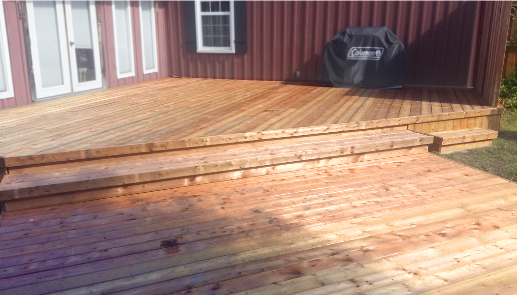 Open Concept Deck with Brown Treated Trim